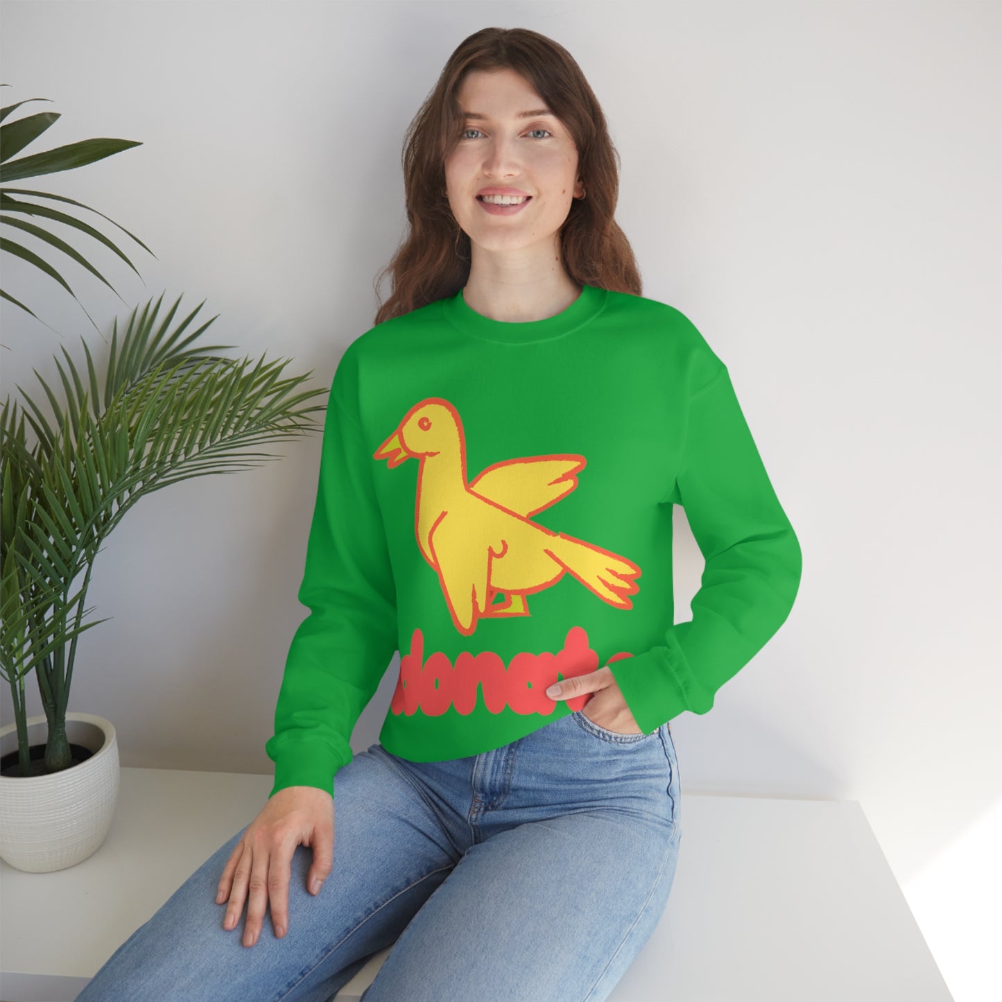 DONATE YELLOW BIRD Unisex Heavy Blend™ Crewneck Sweatshirt | UNHR Donation for a cause