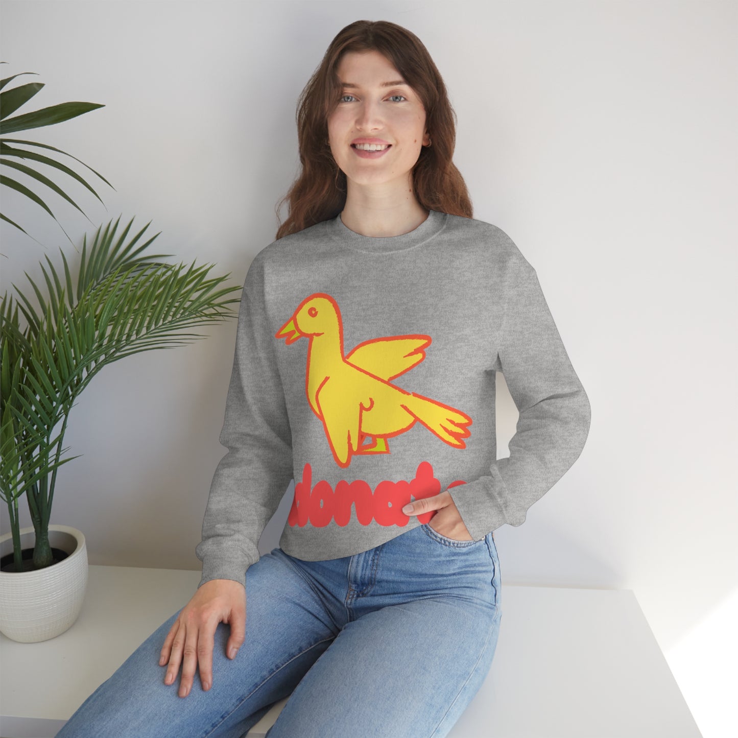 DONATE YELLOW BIRD Unisex Heavy Blend™ Crewneck Sweatshirt | UNHR Donation for a cause