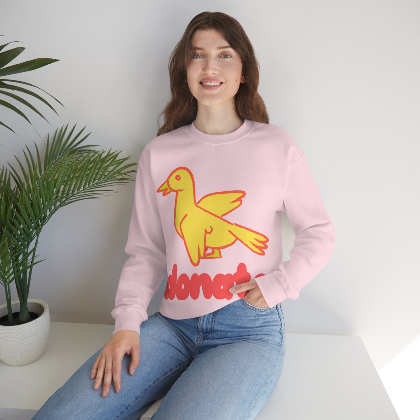 DONATE YELLOW BIRD Unisex Heavy Blend™ Crewneck Sweatshirt | UNHR Donation for a cause