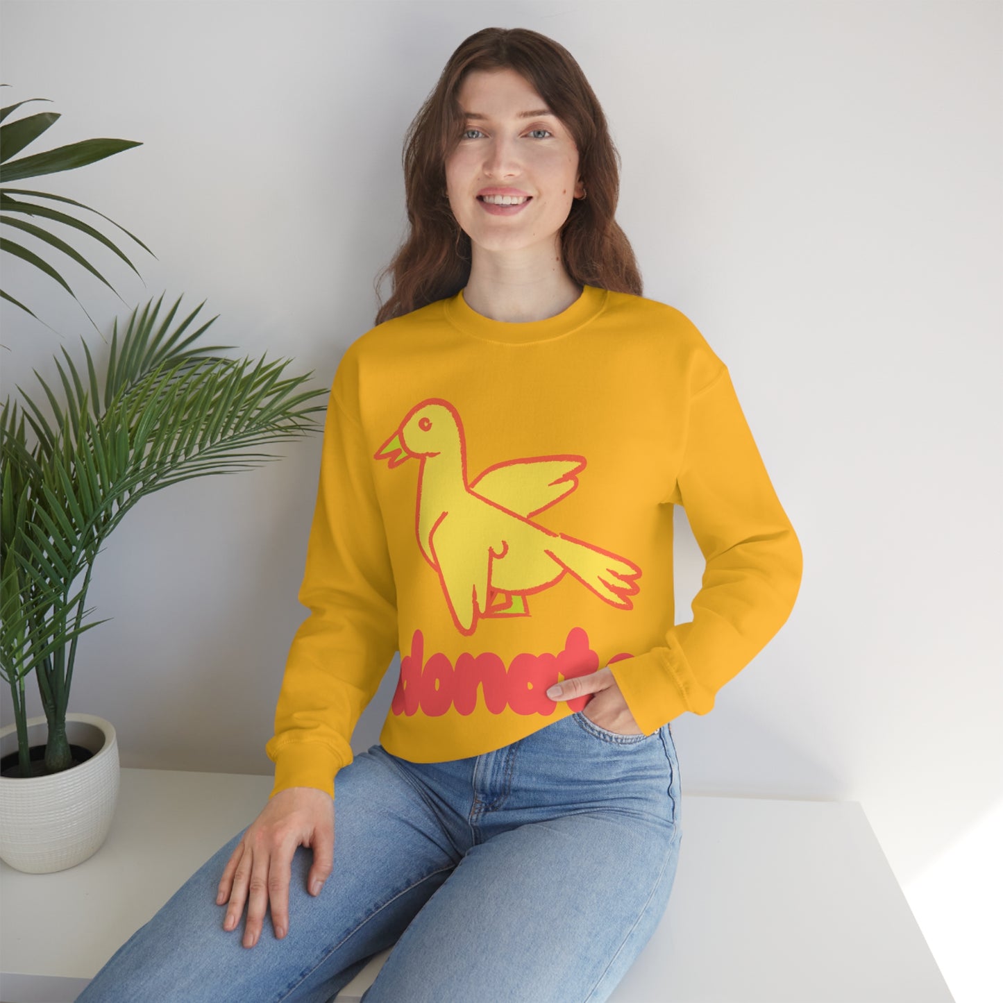 DONATE YELLOW BIRD Unisex Heavy Blend™ Crewneck Sweatshirt | UNHR Donation for a cause